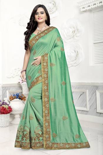 This Festive And Wedding Season In This Very Pretty Colored Designer Saree Paired With Blouse. This Saree Are Two Tone Vichitra Silk and Blouse Are Vichitra Silk Based Beautified With Detailed Heavy Jari Embroidery Work. 