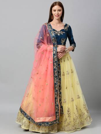 Evergreen Combination Is Here With This Heavy Designer Lehenga Choli In Light Color. Its Blouse And Lehenga Are Fabricated On Satin Silk Paired With Net Fabricated Dupatta. Buy Now