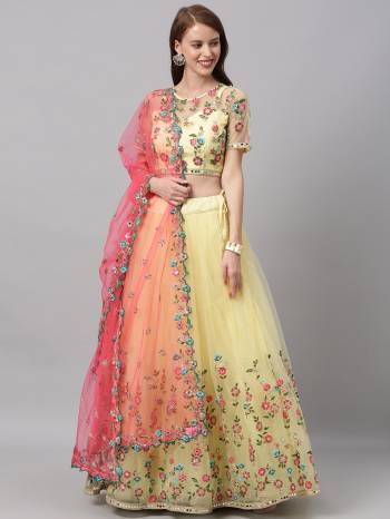 Evergreen Combination Is Here With This Heavy Designer Lehenga Choli In Light Color. Its Blouse And Lehenga Are Fabricated On Net Paired With Net Fabricated Dupatta. Buy Now