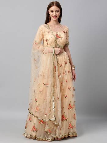 Evergreen Combination Is Here With This Heavy Designer Lehenga Choli In Light Color. Its Blouse And Lehenga Are Fabricated On Net Paired With Net Fabricated Dupatta. Buy Now