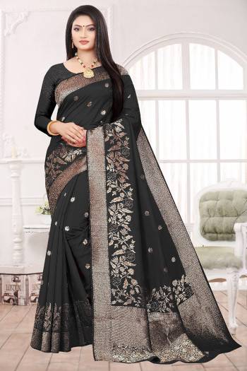 Adorn The Pretty Angelic Look Wearing This Heavy Designer Wevon Saree In Black Color Paired With Blouse. This Saree Is Fabricated On Soft Art Silk Paired With Art Silk Fabricated Blouse. Its Pretty Color Pallete Will Give An Attractive Look To Your Personality. 