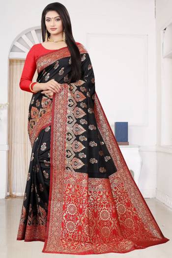 Look Attractive Wearing This Black Colored Saree Paired With Red Colored Blouse.  This Heavy Wevon Designer Saree Is Soft Litchi Silk Based Which Gives A Rich Look To Your Personality. Buy This Pretty Saree Now.