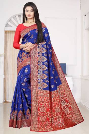 Look Attractive Wearing This Royal Blue Colored Saree Paired With Red Colored Blouse.  This Heavy Wevon Designer Saree Is Soft Litchi Silk Based Which Gives A Rich Look To Your Personality. Buy This Pretty Saree Now.