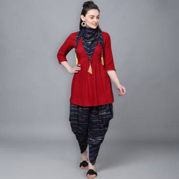 Attrective Look This Readymade Kurti,Dhoti And Scarf In Fine Color Fabricated On Rayon Beautified With Printed. It Is Light In Weight And Easy To Carry All Day Long. 