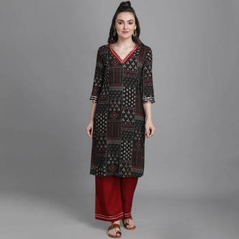 Simple and Elegant Looking Readymade Pair Of Kurti And Plazzo Is Here In Black Color, This Pretty Pair Is Fabricated On Rayon Beautified With Prints, Also It Is Available In All Regular Sizes.