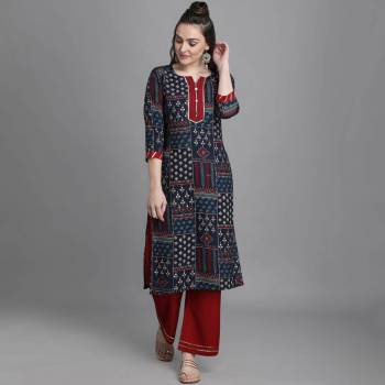 Simple and Elegant Looking Readymade Pair Of Kurti And Plazzo Is Here In Nevy Blue Color, This Pretty Pair Is Fabricated On Rayon Beautified With Prints, Also It Is Available In All Regular Sizes.