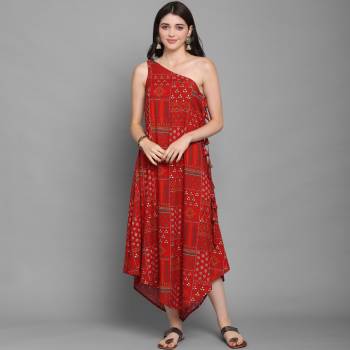 Grab This Pretty Party Wear One-Piece In Lovely color Fabricated On Rayon. Its Lovely Crush Pattern Gives A Unique Look And Also This Dres Is Available In All Regular Sizes.