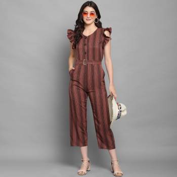 Grab This Pretty Party Wear One-Piece In Lovely color Fabricated On Viscose. Its Lovely Crush Pattern Gives A Unique Look And Also This Dres Is Available In All Regular Sizes.