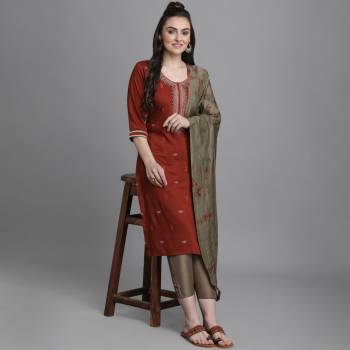 Here Is A Pretty Designer Readymade Dress In Fine Colored Top Paired With Bottom and Dupatta. Its Top Is Fabricated On Chinon Paired With Bottom And Cotton Dupatta.