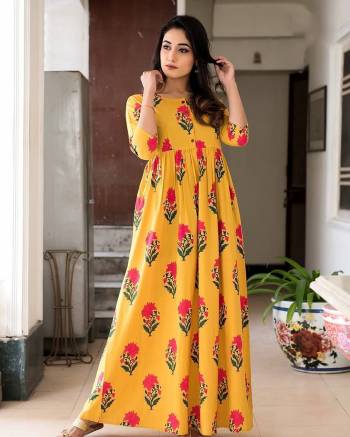 Flaunt Your Rich And Elegant Taste Wearing This Designer Readymade Long Gown In Yellow Gold Color. This  Pretty Gown Is Fabricated On Maslin Beautified With Digital Printed. Its Fabric Is Soft Towards Skin And Easy To Carry All Day Long. 