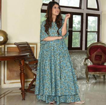 Simple and Elegant Looking Readymade Pair Of Kurti And Plazzo Is Here In Light Color, This Pretty Pair Is Fabricated On Maslin Beautified With Digital Prints, Also It Is Available In All Regular Sizes.