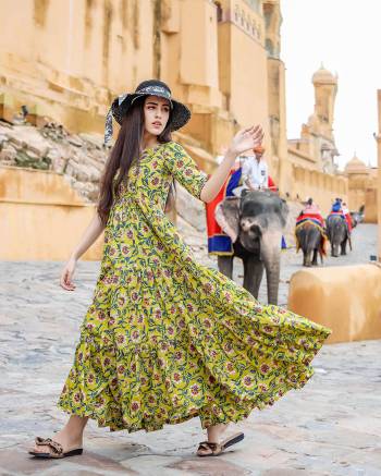 Your Rich And Elegant Taste Wearing This Designer Readymade Long Gown In Yellow Color. This  Pretty Gown Is Fabricated On Maslin with Cotton Crepe Inner Beautified With Digital Printed With Matching Mask. Its Fabric Is Soft Towards Skin And Easy To Carry All Day Long. 