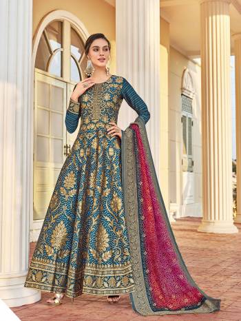 Look Pretty In This Beautiful Readymade Designer Floor Length Gown In Teal Color Paired With Pink Colored Dupatta. This Stitched Gown Are Jacquard And Dupatta Are Dola Silk Fabricated On  Beautified With Pretty Jacquard Work. Buy Now.