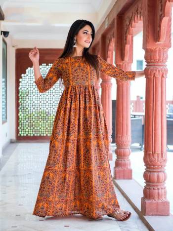 Grab This Readymade Long Kurti In Dark Coral Color Fabricated On Maslin Silk Beautified With Digital Prined. It Is Light In Weight And Easy To Carry All Day Long. 