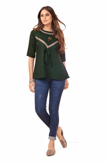 Attrective Look This Readymade Short Kurti In Fine Color Fabricated On Rayon Beautified With Hand Work. It Is Light In Weight And Easy To Carry All Day Long. 