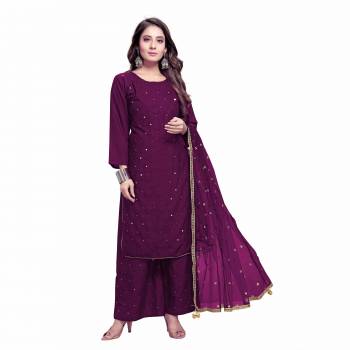 Grab This Designer Mirror Embroidery Readymade Dress In Wine Colored Top Paired With Bottom And Dupatta. This Dress Material Is Rayon Based Paired With Top And Botton And Net Designer Fabricated Dupatta With Sequance Work And Border With Latkan .