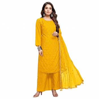 Grab This Designer Mirror Embroidery Readymade Dress In Yellow Colored Top Paired With Bottom And Dupatta. This Dress Material Is Rayon Based Paired With Top And Botton And Net Designer Fabricated Dupatta With Sequance Work And Border With Latkan .