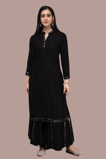 Simple and Elegant Looking Readymade Pair Of Kurti And Plazzo Is Here In Black Color, This Pretty Pair Is Fabricated On Rayon Beautified With Mirror Work, Also It Is Available In All Regular Sizes.