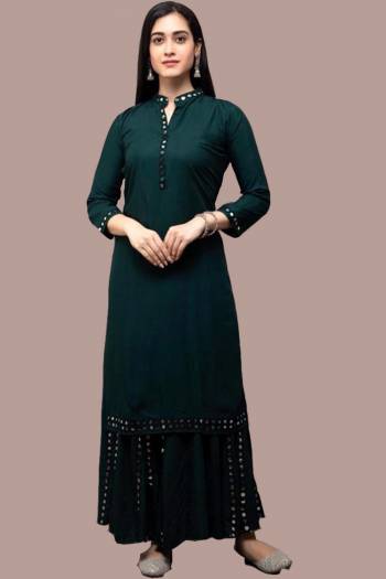 Simple and Elegant Looking Readymade Pair Of Kurti And Plazzo Is Here In Green Color, This Pretty Pair Is Fabricated On Rayon Beautified With Mirror Work, Also It Is Available In All Regular Sizes.