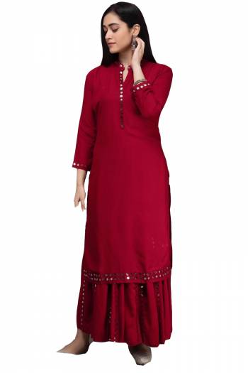 Simple and Elegant Looking Readymade Pair Of Kurti And Plazzo Is Here In Maroon Color, This Pretty Pair Is Fabricated On Rayon Beautified With Mirror Work, Also It Is Available In All Regular Sizes.