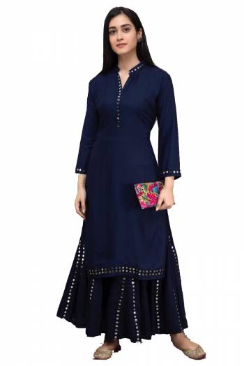 Simple and Elegant Looking Readymade Pair Of Kurti And Plazzo Is Here In Blue Color, This Pretty Pair Is Fabricated On Rayon Beautified With Mirror Work, Also It Is Available In All Regular Sizes.