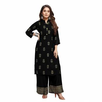 Attrective Looking Readymade Pair Of Kurti And Plazzo Is Here In Black Color, This Pretty Pair Is Fabricated On Rayon Beautified With Foil Printed, Also It Is Available In All Regular Sizes.