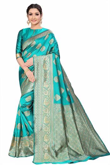 Grab This Pretty Elegant Looking Designer Saree In Fine Color Paired With Blouse. This Saree And Blouse Litchi Silk Based Beautified With Wevon Jacquard Work. Buy Now.