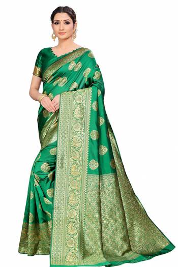 Grab This Pretty Elegant Looking Designer Saree In Fine Color Paired With Blouse. This Saree And Blouse Litchi Silk Based Beautified With Wevon Jacquard Work. Buy Now.