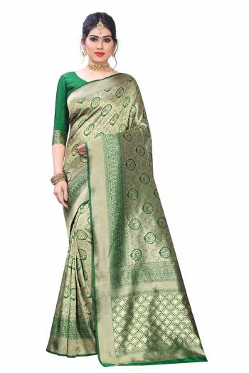 Grab This Pretty Elegant Looking Designer Saree In Fine Color Paired With Blouse. This Saree And Blouse Litchi Silk Based Beautified With Wevon Jacquard Work. Buy Now.