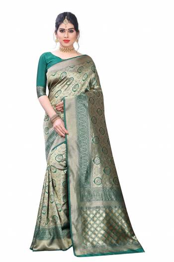 Grab This Pretty Elegant Looking Designer Saree In Fine Color Paired With Blouse. This Saree And Blouse Litchi Silk Based Beautified With Wevon Jacquard Work. Buy Now.