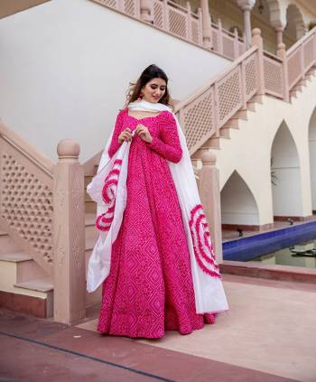 Here Is A Very Pretty Designer Readymade Gown In Pink Color Fabricated on Maslin And Dupatta In White On Maslin. This Gown Is Beautified Pigment With Foil Prints And It Is Soft Towards Skin Which Is Easy To Carry All Day Long.