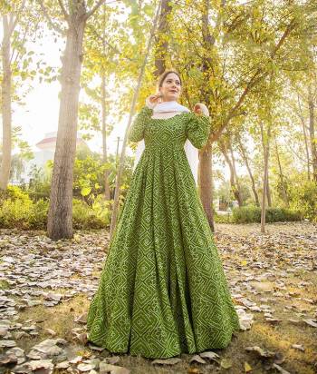 Here Is A Very Pretty Designer Readymade Gown In Green Color Fabricated on Maslin And Dupatta In White On Maslin. This Gown Is Beautified Pigment With Foil Prints And It Is Soft Towards Skin Which Is Easy To Carry All Day Long.