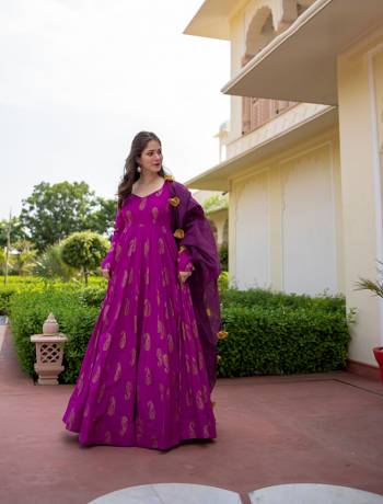 Here Is A Very Pretty Designer Readymade Gown In Magenta Color Fabricated on Rayon And Dupatta In Wine On Naznin. This Gown Is Beautified Pigment With Foil Prints And It Is Soft Towards Skin Which Is Easy To Carry All Day Long.