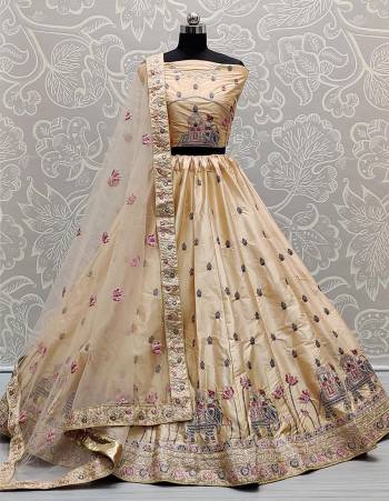 You Will Definitely Earn Lots Of Complimets Wearing This Heavy Designer Lehenga Choli In All Over Peach Color. This Heavy Embroidered Lehenga Choli Is Silk Based Paired With Soft Net Fabricated Dupatta, It Is Beautified With Lovely Detailed Embroidery Giving An Attractive Look.