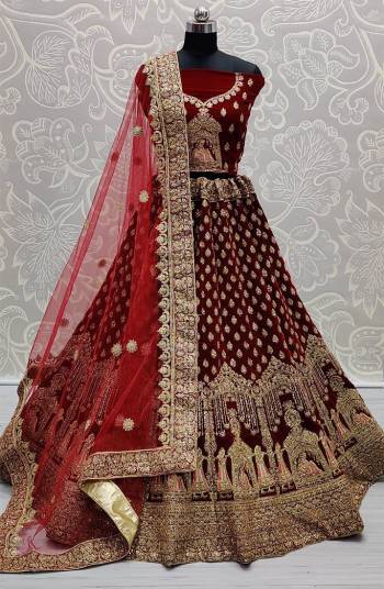 Attrective Look Heavy Designer Lehenga Choli And Dupatta In Maroon Color Fabricated Choli And Lehenga Are Velvet And Dupatta Are Soft Net With Heavy Attractive Jari,Dori Embroidery With Diamond Work. 