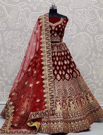 Attrective Look Heavy Designer Lehenga Choli And Dupatta In Maroon Color Fabricated Choli And Lehenga Are Velvet And Dupatta Are Soft Net With Heavy Attractive Jari,Dori Embroidery With Diamond Work. 