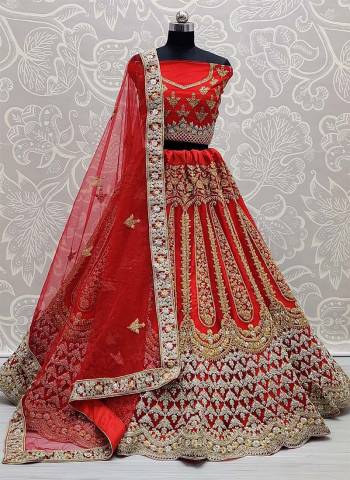 Garb This Heavy Designer Lehenga Choli In All Over Color. This Heavy Embroidered Lehenga Choli Is Net Based Paired With Soft Net Fabricated Dupatta, It Is Beautified With Lovely Detailed Embroidery And Diamond Giving An Attractive Look.