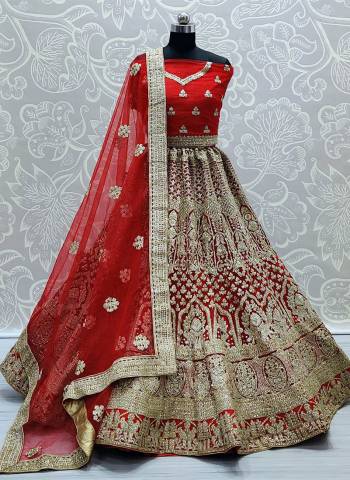 Garb This Heavy Designer Lehenga Choli In All Over Color. This Heavy Embroidered Lehenga Choli Is Net Based Paired With Soft Net Fabricated Dupatta, It Is Beautified With Lovely Detailed Embroidery And Diamond Giving An Attractive Look.