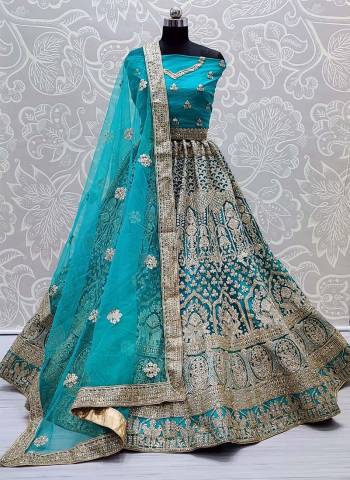 Garb This Heavy Designer Lehenga Choli In All Over Color. This Heavy Embroidered Lehenga Choli Is Net Based Paired With Soft Net Fabricated Dupatta, It Is Beautified With Lovely Detailed Embroidery And Diamond Giving An Attractive Look.