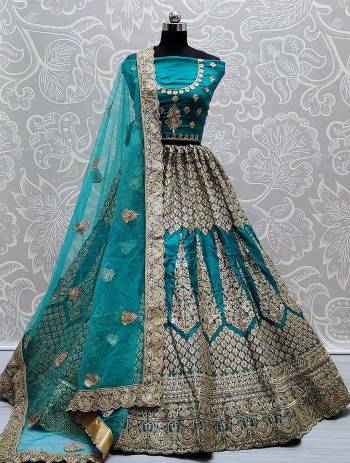 Attrective Look Heavy Designer Lehenga Choli In Fine Color Fabricated On Silk And Dupatta Are Soft Net With Heavy Attractive Jari,Dori Embroidery With Diamond Work. 