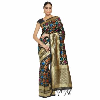 Adorn The Pretty Angelic Look Wearing This Heavy Wevon Designer Saree In Fine Color Paired With Colored Blouse. This Saree Is Fabricated On Banarasi Silk Paired With Blouse. Its Pretty Color Pallete Will Give An Attractive Look To Your Personality. 