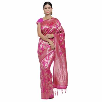 Adorn The Pretty Angelic Look Wearing This Heavy Wevon Designer Saree In Fine Color Paired With Colored Blouse. This Saree Is Fabricated On Banarasi Silk Paired With Blouse. Its Pretty Color Pallete Will Give An Attractive Look To Your Personality. 