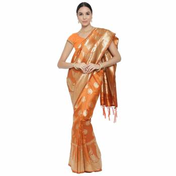 Adorn The Pretty Angelic Look Wearing This Heavy Wevon Designer Saree In Fine Color Paired With Colored Blouse. This Saree Is Fabricated On Banarasi Silk Paired With Blouse. Its Pretty Color Pallete Will Give An Attractive Look To Your Personality. 