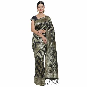 Adorn The Pretty Angelic Look Wearing This Heavy Wevon Designer Saree In Fine Color Paired With Colored Blouse. This Saree Is Fabricated On Banarasi Silk Paired With Blouse. Its Pretty Color Pallete Will Give An Attractive Look To Your Personality. 