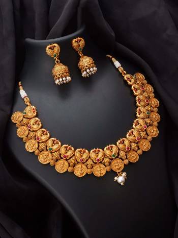 Give An Enhanced Look To Your Personality By Pairing Up This Beautiful Necklace Set With Your Ethnic Attire. This Pretty Set Is In Copper Color Beautified With Kundan Work. Buy Now.