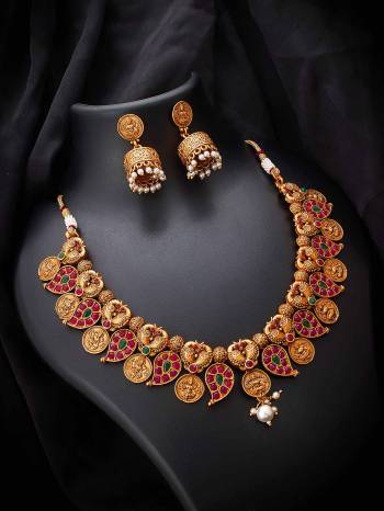 Give An Enhanced Look To Your Personality By Pairing Up This Beautiful Necklace Set With Your Ethnic Attire. This Pretty Set Is In Copper Color Beautified With Kundan Work. Buy Now.