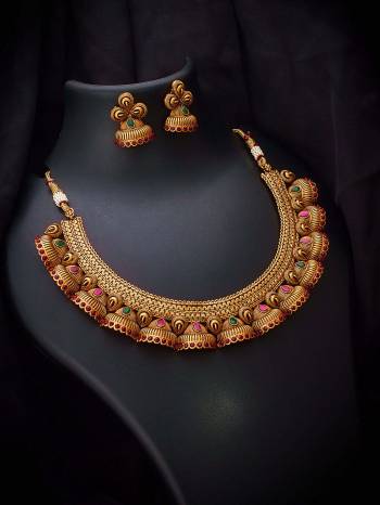 Give An Enhanced Look To Your Personality By Pairing Up This Beautiful Necklace Set With Your Ethnic Attire. This Pretty Set Is In Copper Color Beautified With Kundan Work. Buy Now.