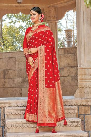 Celebrate This Festive Season In This Very Pretty Red Colored Designer Saree Paired With Blouse. This Saree and Blouse Are Silk Based Beautified With Detailed Wevon Designer Work. 