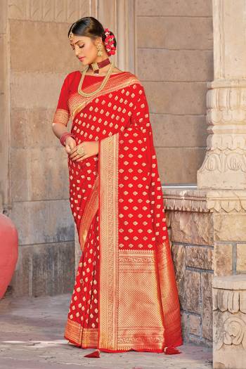 Celebrate This Festive Season In This Very Pretty Red Colored Designer Saree Paired With Blouse. This Saree and Blouse Are Silk Based Beautified With Detailed Wevon Designer Work. 