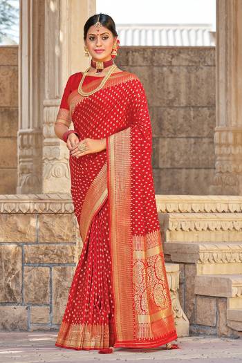 Celebrate This Festive Season In This Very Pretty Red Colored Designer Saree Paired With Blouse. This Saree and Blouse Are Silk Based Beautified With Detailed Wevon Designer Work. 